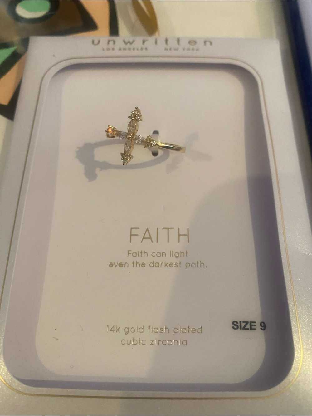 Unwritten Gold Cross Ring with Clear Stones